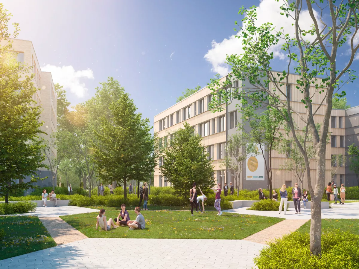 Blick in den Innenhof des Bürocampus H3ö mit Rasenfläche Menschen und Sitzmöglichkeiten